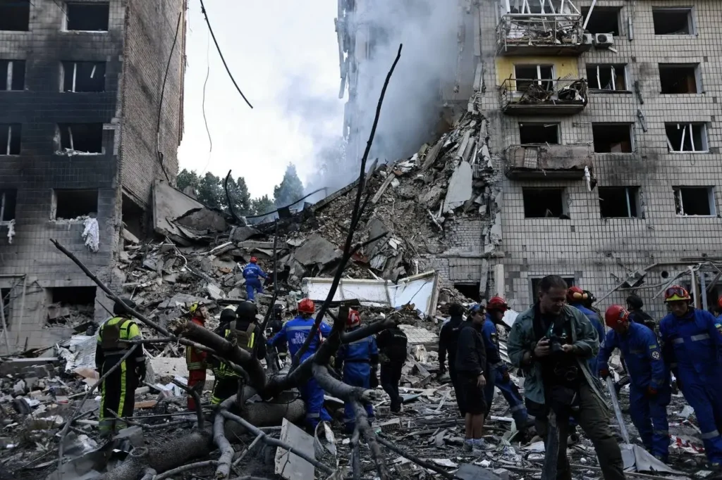 Death toll from Russian attack rises in Kyiv: photos of aftermath